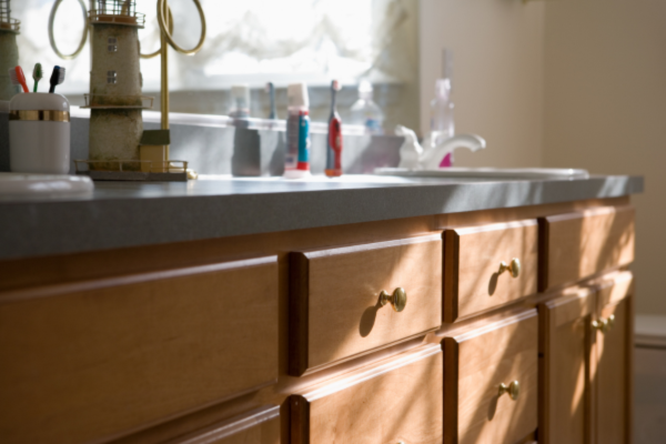 Maximizing Storage and Functionality: Organizing a Small Bathroom with Multifunctional Custom Cabinets